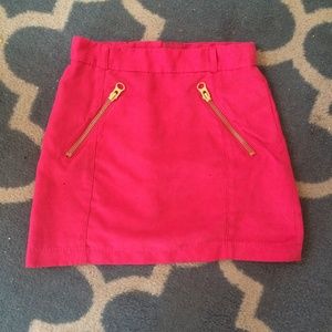 Hot pink faux suede mini-skirt